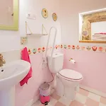Aparthotel La Anos 50. La Casa Barbie. Banera, Chimenea